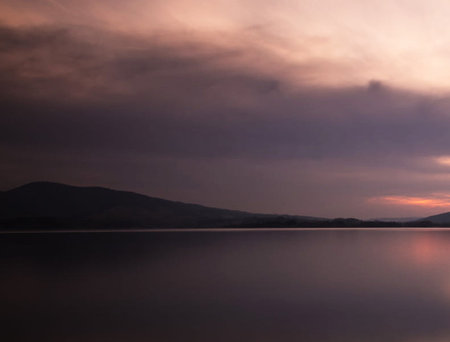 Sunset at Lake Ohrid, Macedonia, with the mountains in the backgroundの写真素材