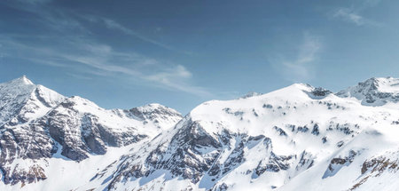 Panoramic view of the snowy mountains in the French Alps.