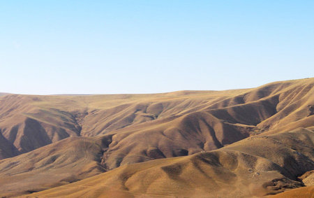 Mongolian landscape, mountains and blue sky in the backgroundの写真素材