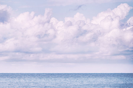 Beautiful seascape with blue sky and white clouds - Vintage Filterの写真素材