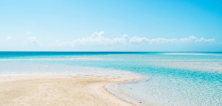 Panoramic view of sandy beach and turquoise sea waterの写真素材