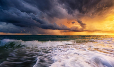 Stormy sky over the sea at sunset. Beautiful seascape.の写真素材