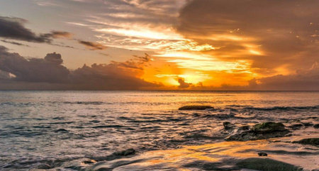 Sunset on the beach at Khao Lak, Phuket, Thailandの写真素材