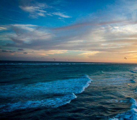 Beautiful sunset over the ocean. Beautiful seascape with blue sky.