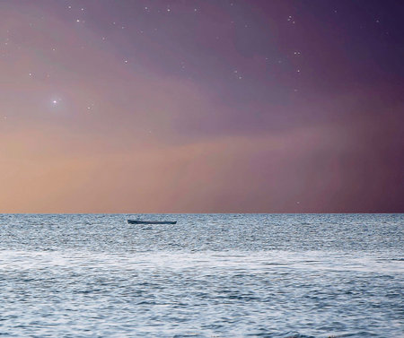 Fishing boat in the sea at night with starry sky.の写真素材