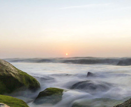 Beautiful sunset at the beach in South Korea,Seongsan Ilchulbongの写真素材