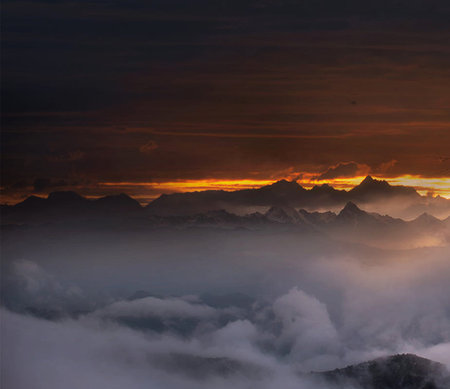 Sunrise over the clouds in the Himalayas, Nepal.の写真素材