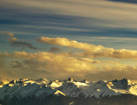 Mountains and clouds at sunset in the alps of Switzerland.