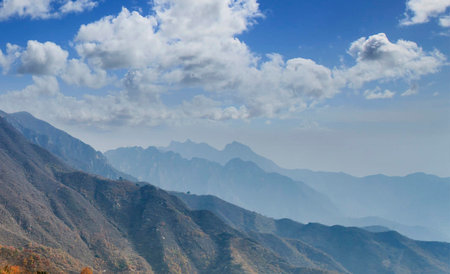 Mountain landscape under the blue sky and white clouds, China.の写真素材
