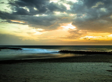 Beautiful sunset at the beach in Khao Lak, Thailand.の写真素材