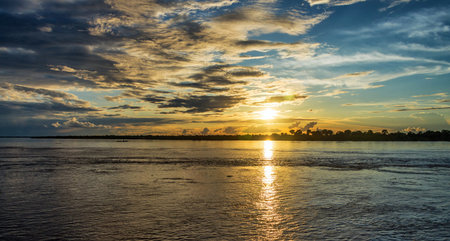 Sunset on the Mekong River in the Mekong Delta, Vietnamの写真素材