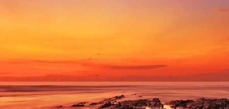 Beautiful sunset on the beach. Nature composition. Toned.の写真素材
