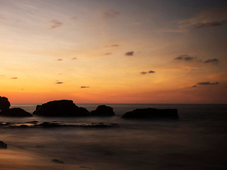 Beautiful sunset at the beach in Phuket, Thailand.の写真素材