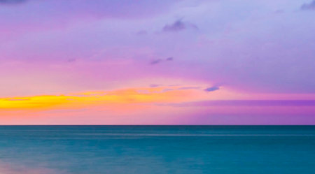 Sunset over the sea. Panorama of the sea at sunset.