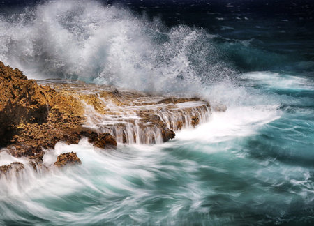 Waves crashing on the rocks in Maui, Hawaii, USAの写真素材