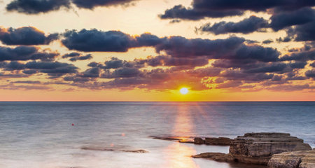 Sunset over the sea. Beautiful seascape at sunset.