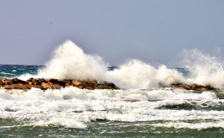 Big waves breaking on the rocks on the coast of Atlantic ocean.