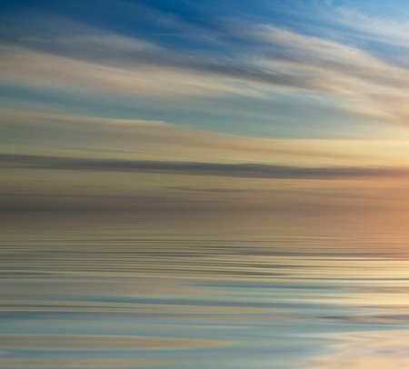 beautiful sunset over the sea with reflection in water, nature seriesの写真素材