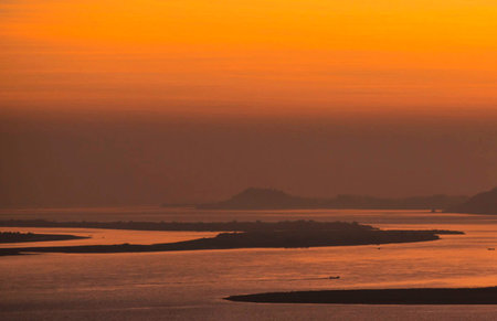 beautiful sunset over the sea in the evening, closeup of photoの写真素材