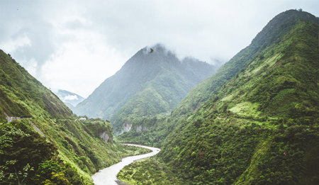 Mountain road through the valley. Panoramic view.
