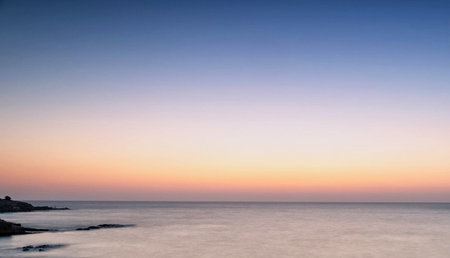 Sunset over the Mediterranean Sea, Tarragona, Catalonia, Spainの写真素材