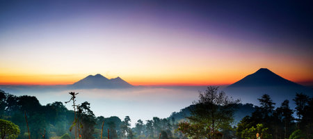 Beautiful sunrise over the mountains in the morning at Doi Inthanon, Chiang Mai, Thailandの写真素材