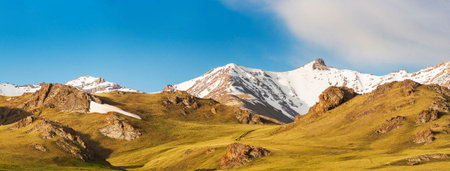 Panoramic view of the snow-capped peaks of the Caucasus Mountains.の写真素材