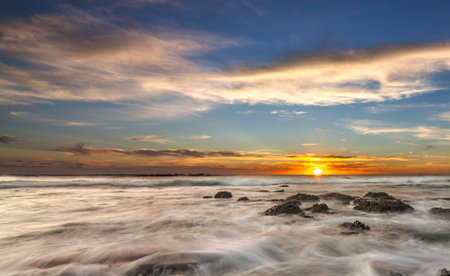 Sunset over the sea, long exposure shot with long exposure techniqueの写真素材