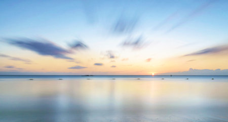 Beautiful sunset on the beach, long exposure photo with long exposure