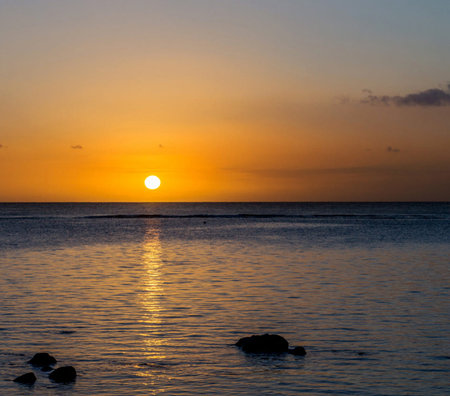 Sunset on the beach in the tropics. Seascape.の写真素材