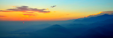 Sunset in the mountains. Panorama of the Himalayas.の写真素材