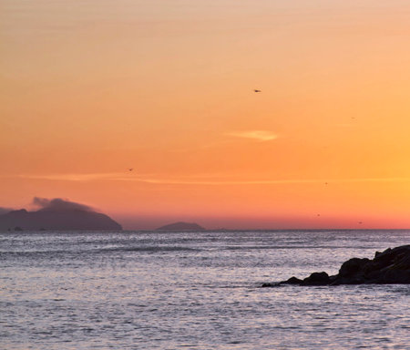 Sunset at the beach in Jeju Island, South Korea.の写真素材