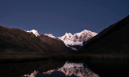 Mountain and lake at night in Cordillera Huayhuash, Peruの写真素材