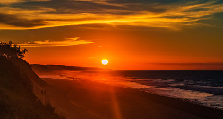 Sunset at the beach of Praia da Rocha, Portugal