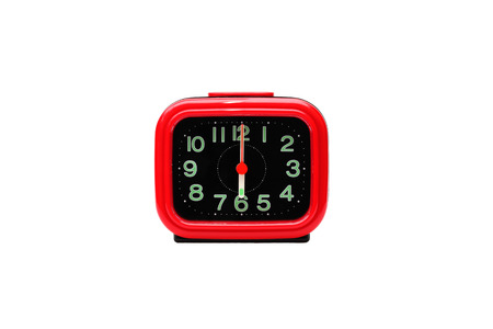 Alarm clock red colour on isolated white background