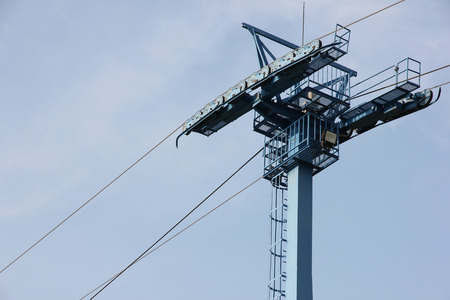 Cable car on blue sky backgroundの写真素材