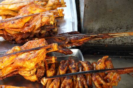 yellow chicken grilledの写真素材