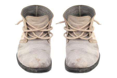 Old gray men shoes isolated on white backgroundの写真素材