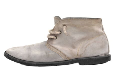 Old gray men shoe isolated on white backgroundの写真素材