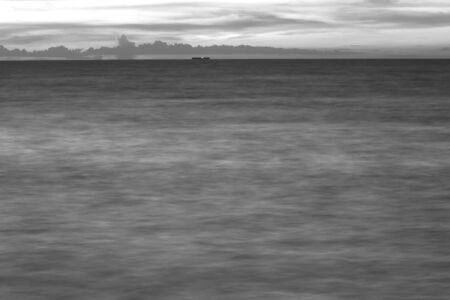 Long exposure photo of beach in the evening, black and whiteの写真素材