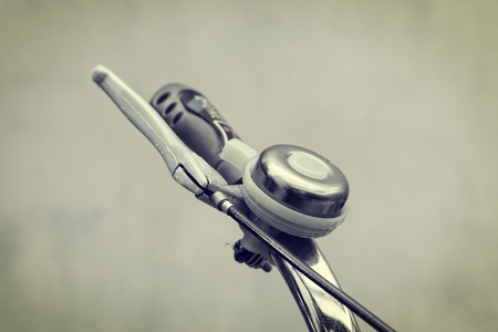 Close up bicycle bell on handlebars  - vintage effect styleの写真素材