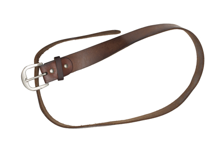 Brown leather belt isolated on white background.の写真素材