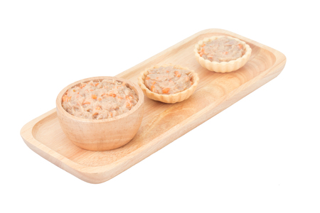 Homemade mini of tuna spread topping in wooden tray on white background.の写真素材