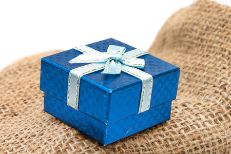 Gift box on brown sackの写真素材
