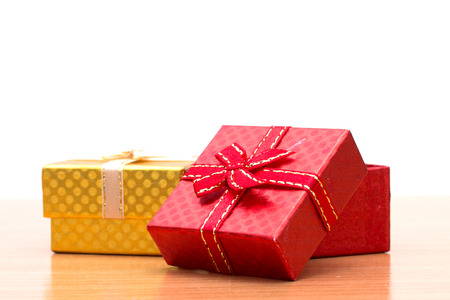 Gift box on brown wooden table.の写真素材