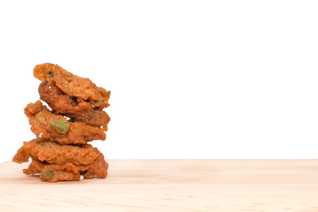 Fried fish patty, Thai style spicy fish ball isolated on white background.の写真素材