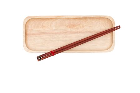 Top view : wood chopsticks and wood tray isolated on white background.の写真素材