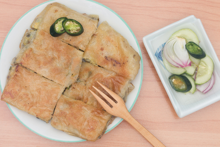 Martabak or murtabak, is a stuffed pancake is arab food.の写真素材