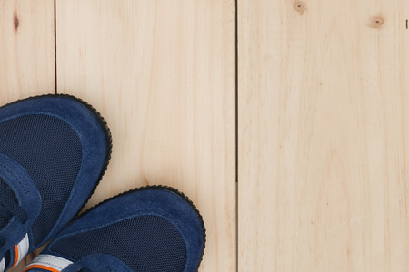 Sport shoes on wooden background.の写真素材