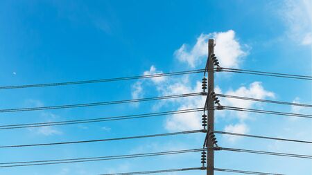 Electricity post with blue sky.の写真素材